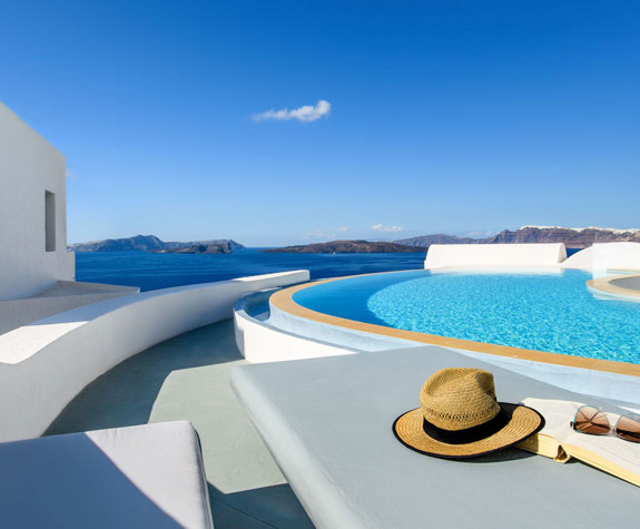 Grand Ambassador Santorini Hotel pool and buildings