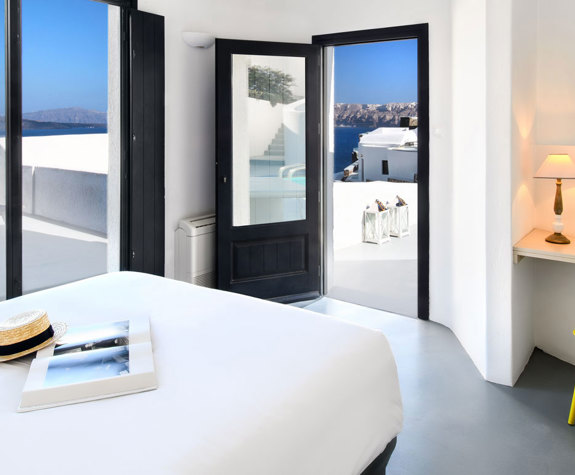 Grand Ambassador Santorini Hotel Luxury Suite bedroom