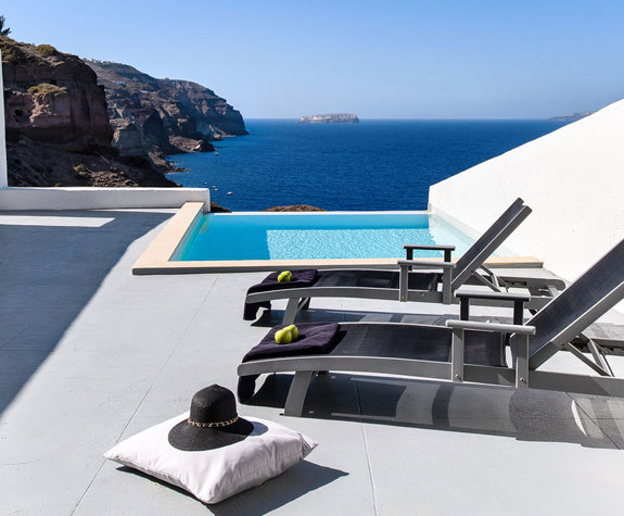 Grand Ambassador Santorini Hotel Infinity Cave Suite balcony pool and sunbeds