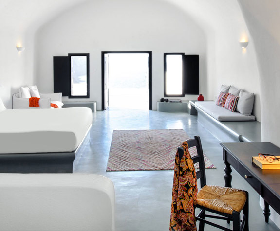 Grand Ambassador Santorini Hotel Infinity Cave Suite bed and interior