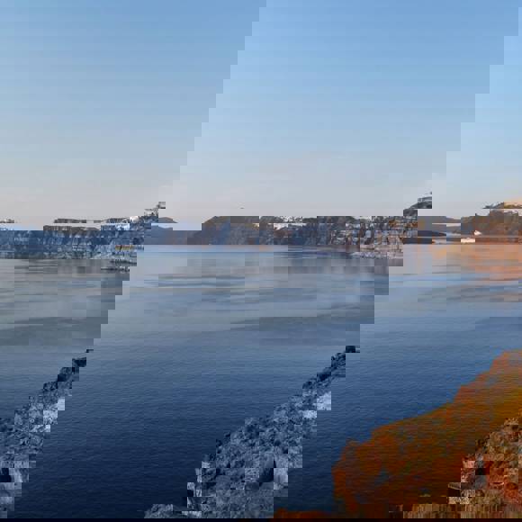 Caldera view of Santorini from Grand Ambassador hotel with cliffs and Aegean Sea