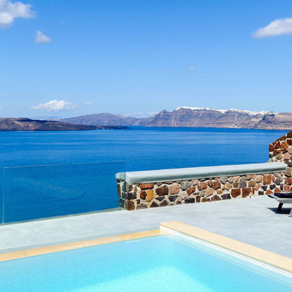 Grand Ambassador Santorini Infinity Cave Suite private terrace with infinity plunge pool and caldera view